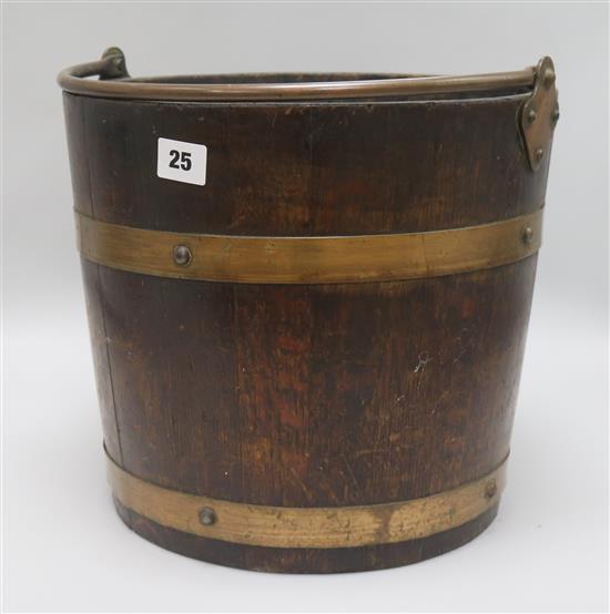 An oak and brass bound bucket